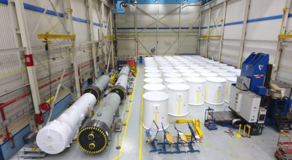 A warehouse with nuclear grade storage containers.