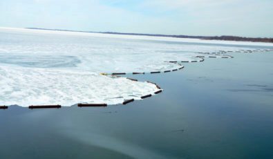 A natural ice arch forms behind the Lake Erie-Niagara ice boom.