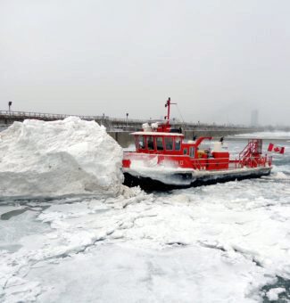 OPG's Niagara Queen II icebreaker takes on a massive ice floe on the Niagara River.