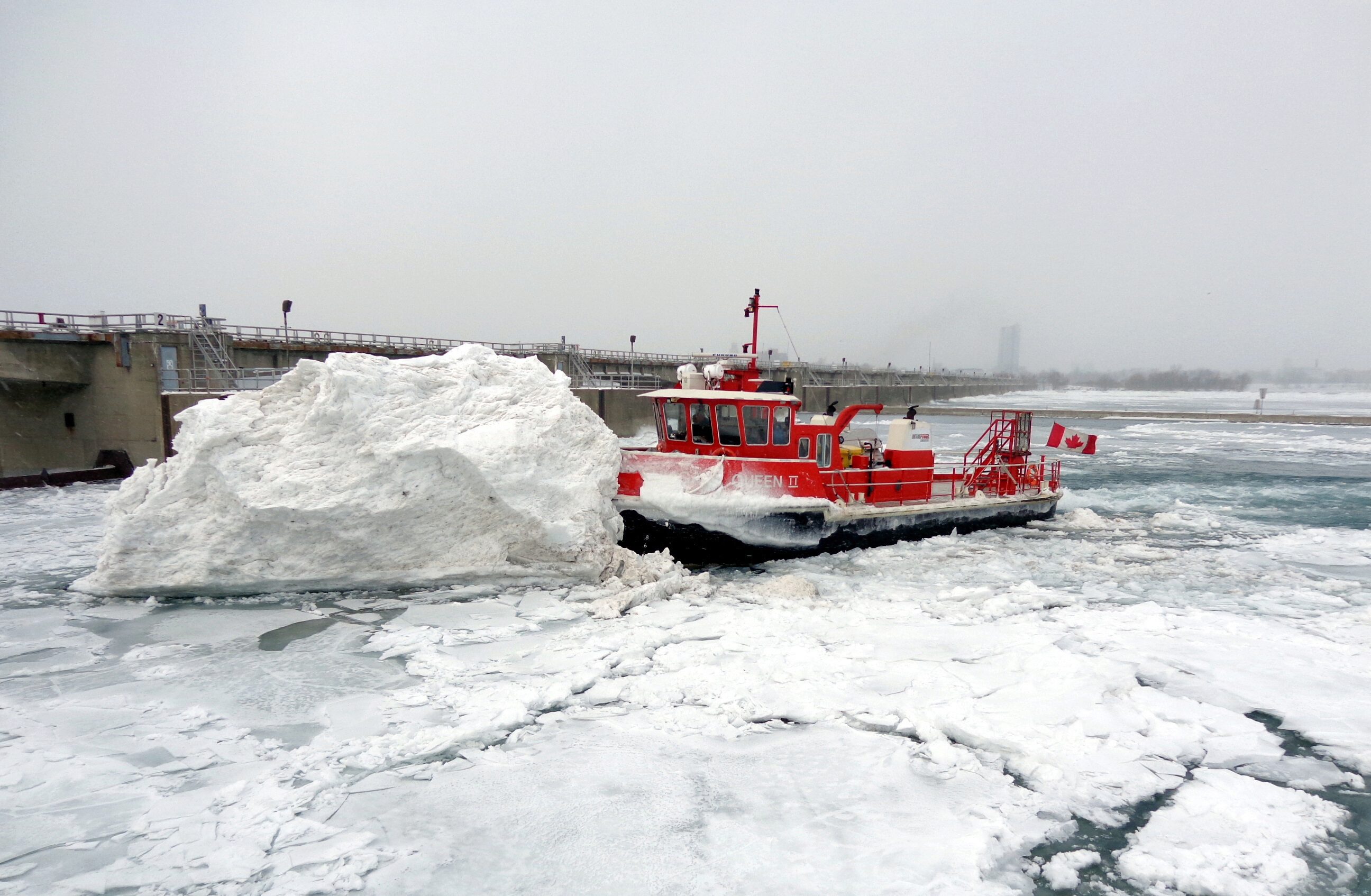 The Niagara Queen II icebreaker breaking up large chunks of ice.