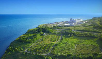 An aerial view of Darlington Nuclear Generating Station from afar.