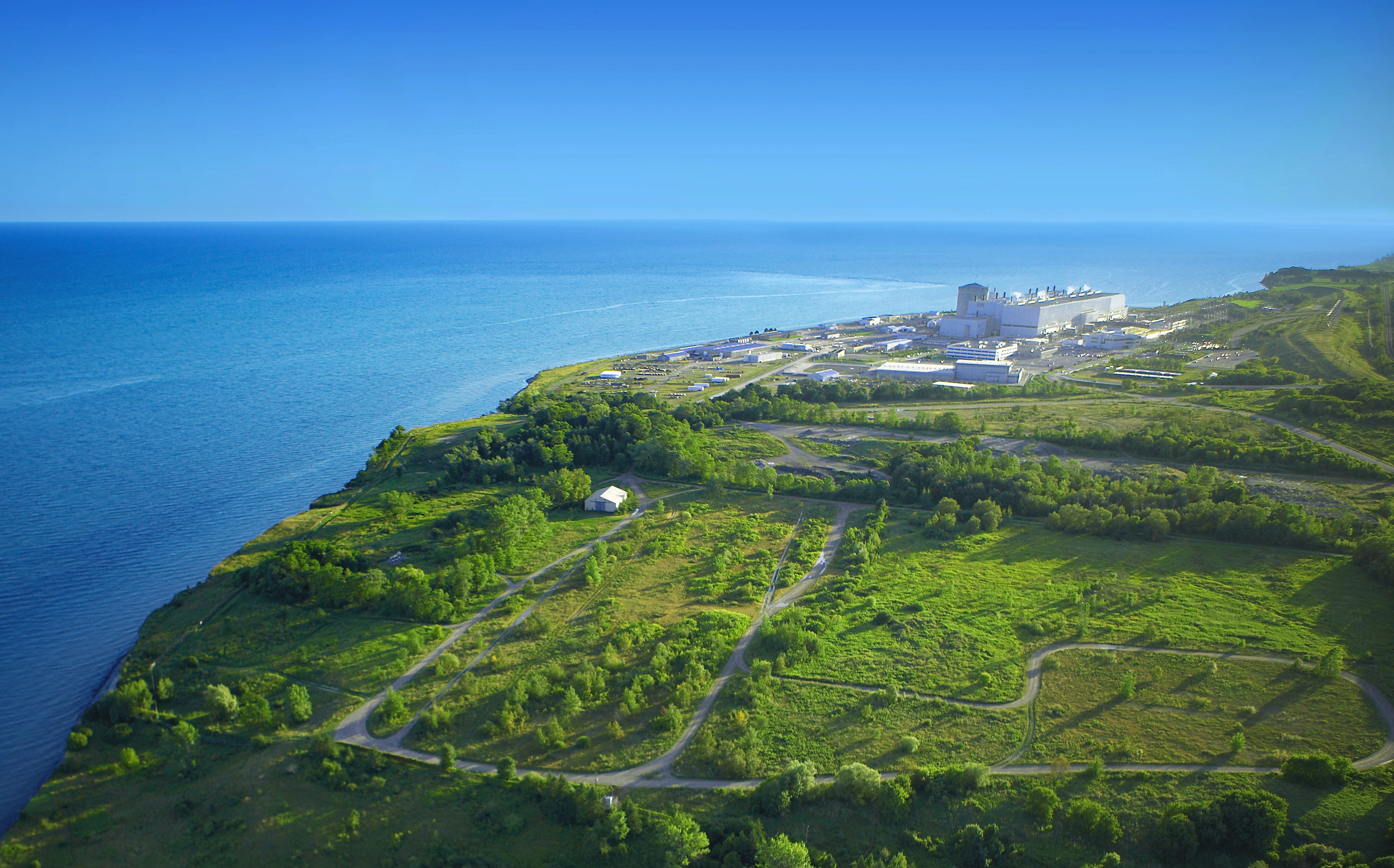 An aerial view of Darlington Nuclear Generating Station from afar.