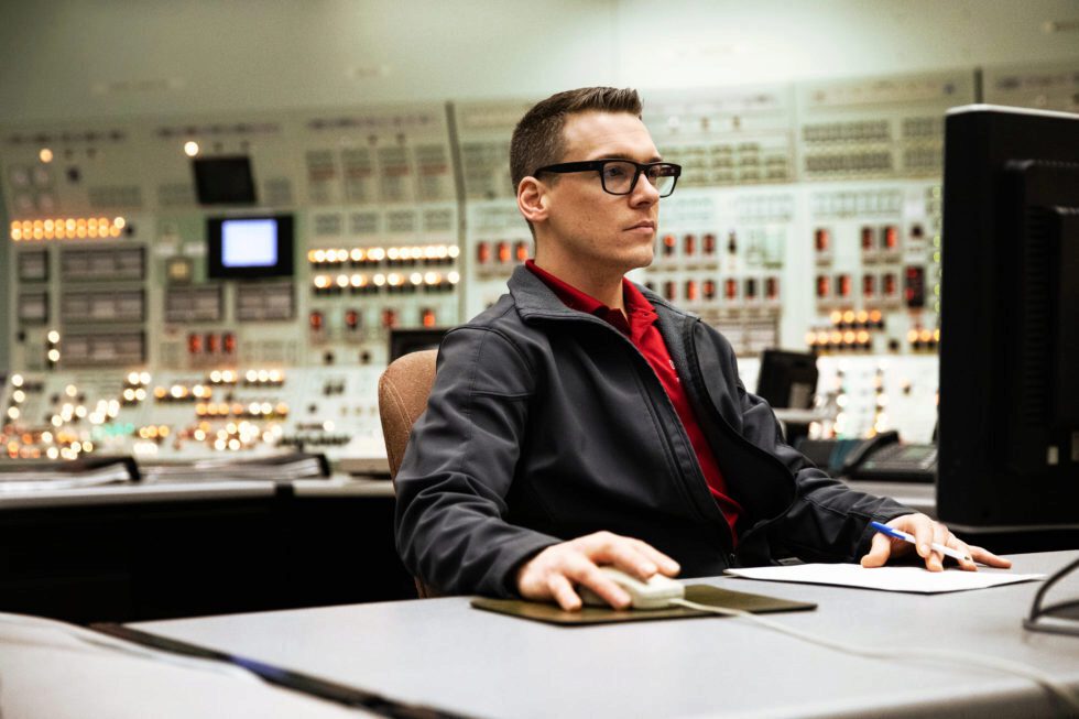 A nuclear operating sits at a computer in the control room at the Pickering Nuclear Generating Station.