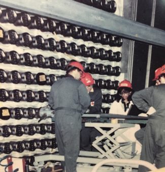 Jennifer Noronha, Grant Wetherill and Ken Wilkins with co-workers at the site of the first fuel load, 30 years ago, at Darlington Nuclear Generating Station.