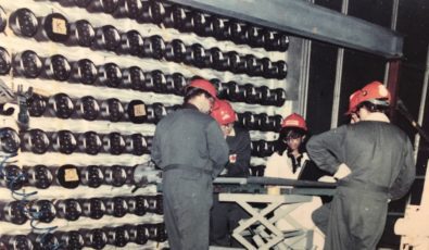 Jennifer Noronha, Grant Wetherill and Ken Wilkins with co-workers at the site of the first fuel load, 30 years ago, at Darlington Nuclear Generating Station.