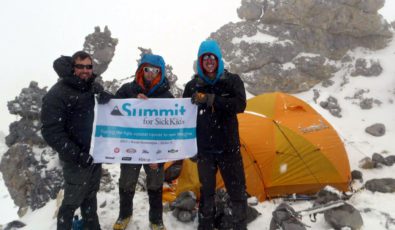 OPG employee Adam McClare, right, at the summit of Mount Aconcagua in Argentina in 2013.