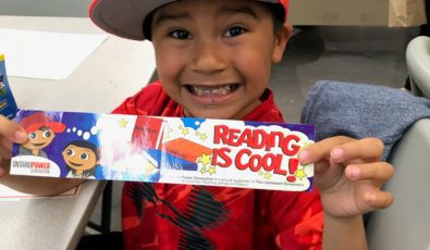 A Moose Cree student was all smiles during a recent Reading is Cool event at the local school.