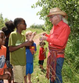 Kids on a nature walk during Tuesdays on the Trail events in Durham Region