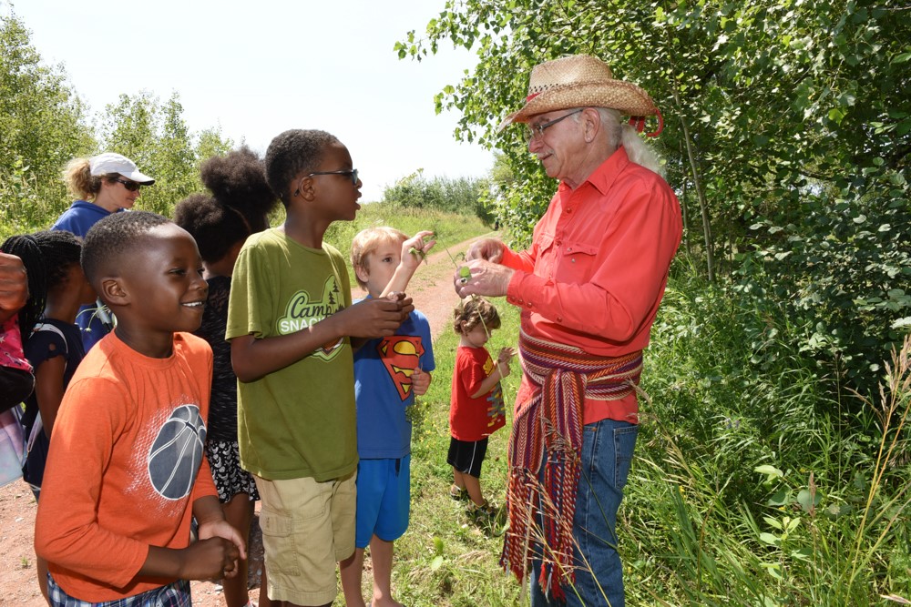Kids on a nature walk during Tuesdays on the Trail events in Durham Region