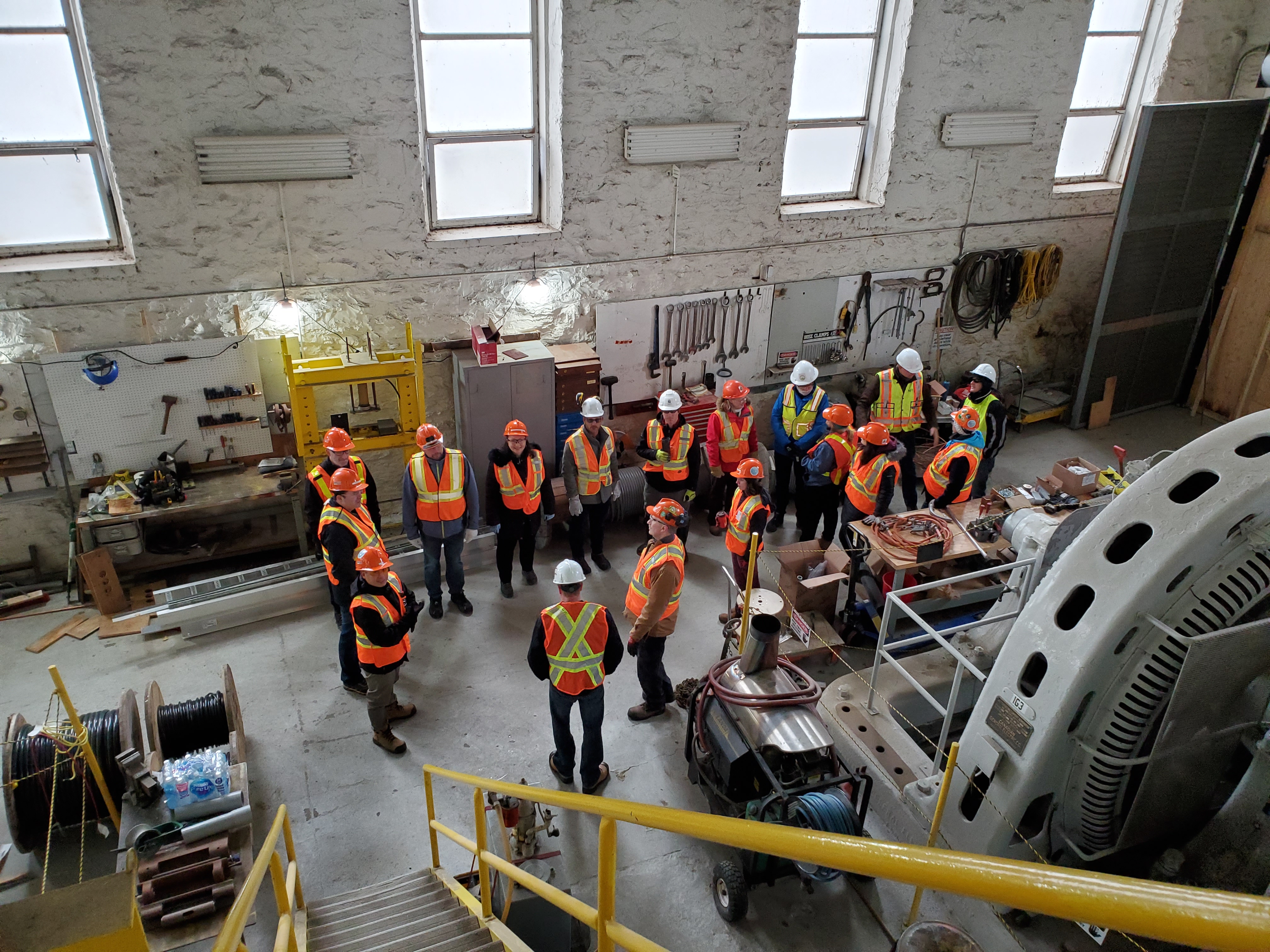 OPG employees gather for a look inside Coniston Generating Station.