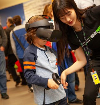 A young visitor gets immersed in a virtual reality demo at OPG's Open House in Darlington.