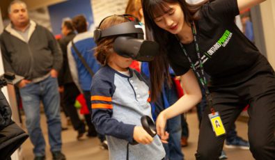 A young visitor gets immersed in a virtual reality demo at OPG's Open House in Darlington.