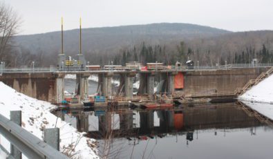 Bark Lake Dam, shown in 2011 undergoing repair work, is a key dam that manages flooding and water levels on the Madawaska River.