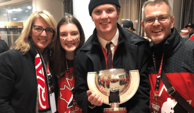 Loni, Tristyn, Ty and Jay Della​ndrea celebrate Team Canada's World Junior championship.