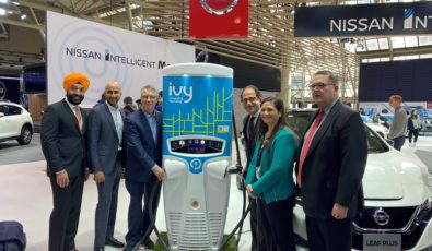 Representatives from OPG, Hydro One and the Province of Ontario gather around an Ivy electric vehicle car charger