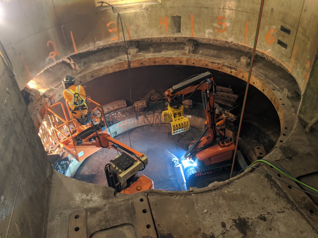 A worker flame cuts the old scroll case, which is set to be replaced as part of the G1 and G2 unit replacement at Sir Adam Beck I GS.