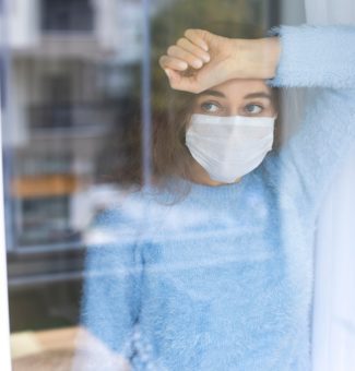 Photo of woman in mask during COVID-19 lockdown.