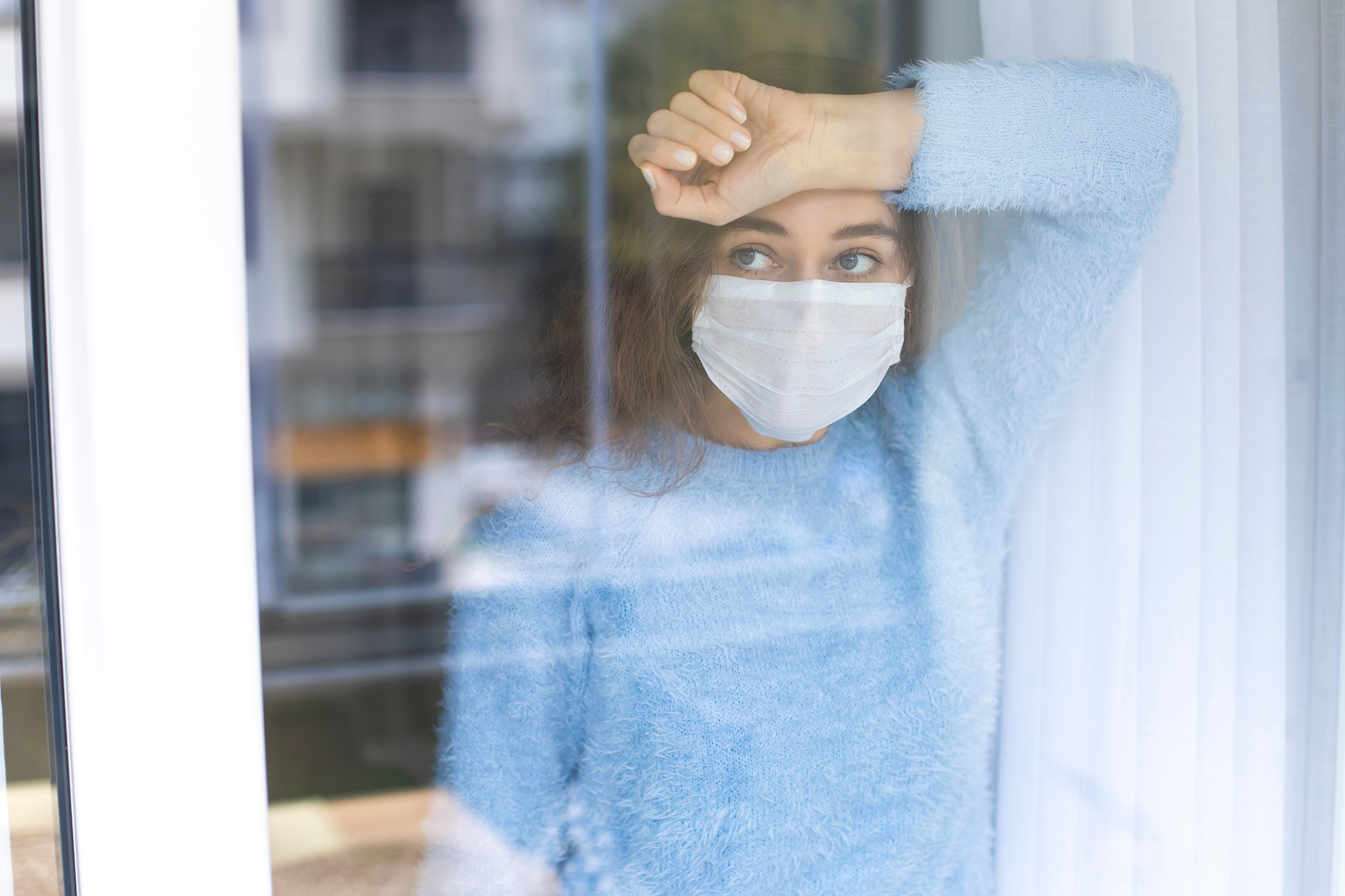 Photo of woman in mask during COVID-19 lockdown.