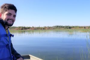 OPG's Adam Melick, an Assistant Environmental Advisor, surveys the wetland area of the Bruce nuclear site.