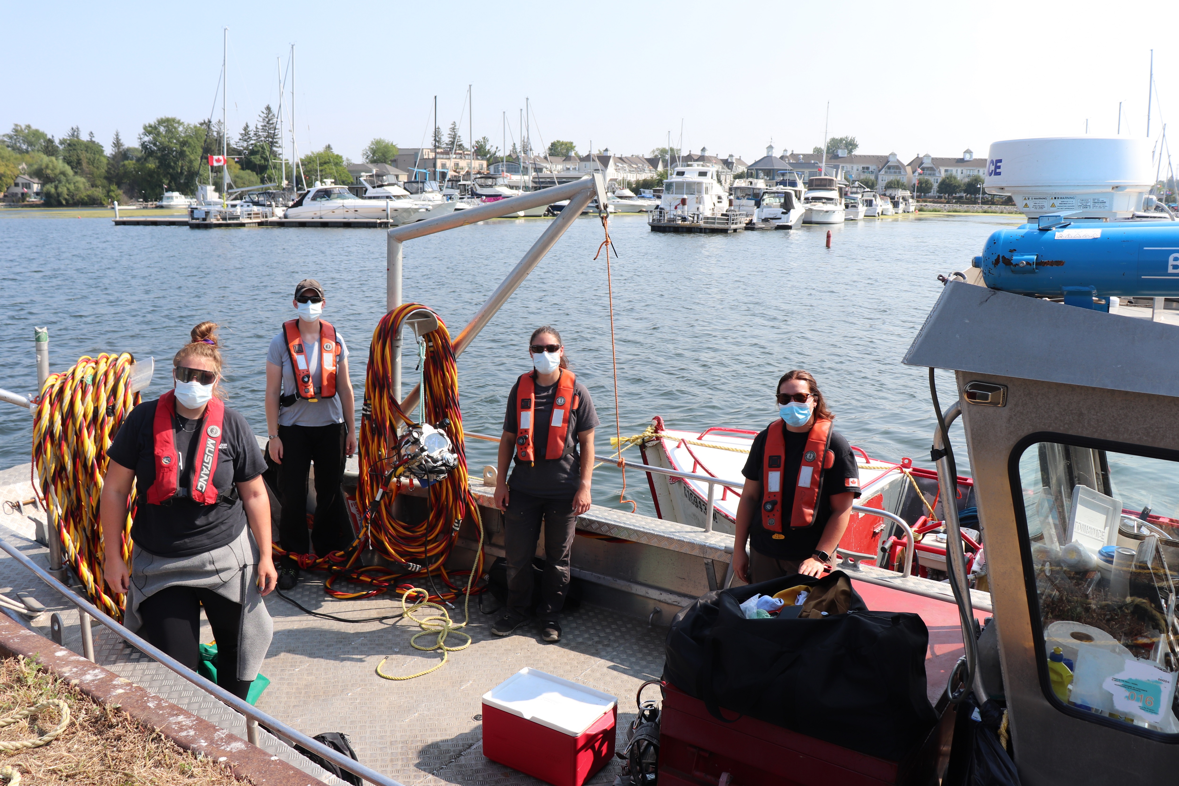 OPG divers (left to right) Samantha Hood, Elizabeth Cole, Drew Burstahler and Jaimie Dack set off on one of the company's first-ever female dives this summer.