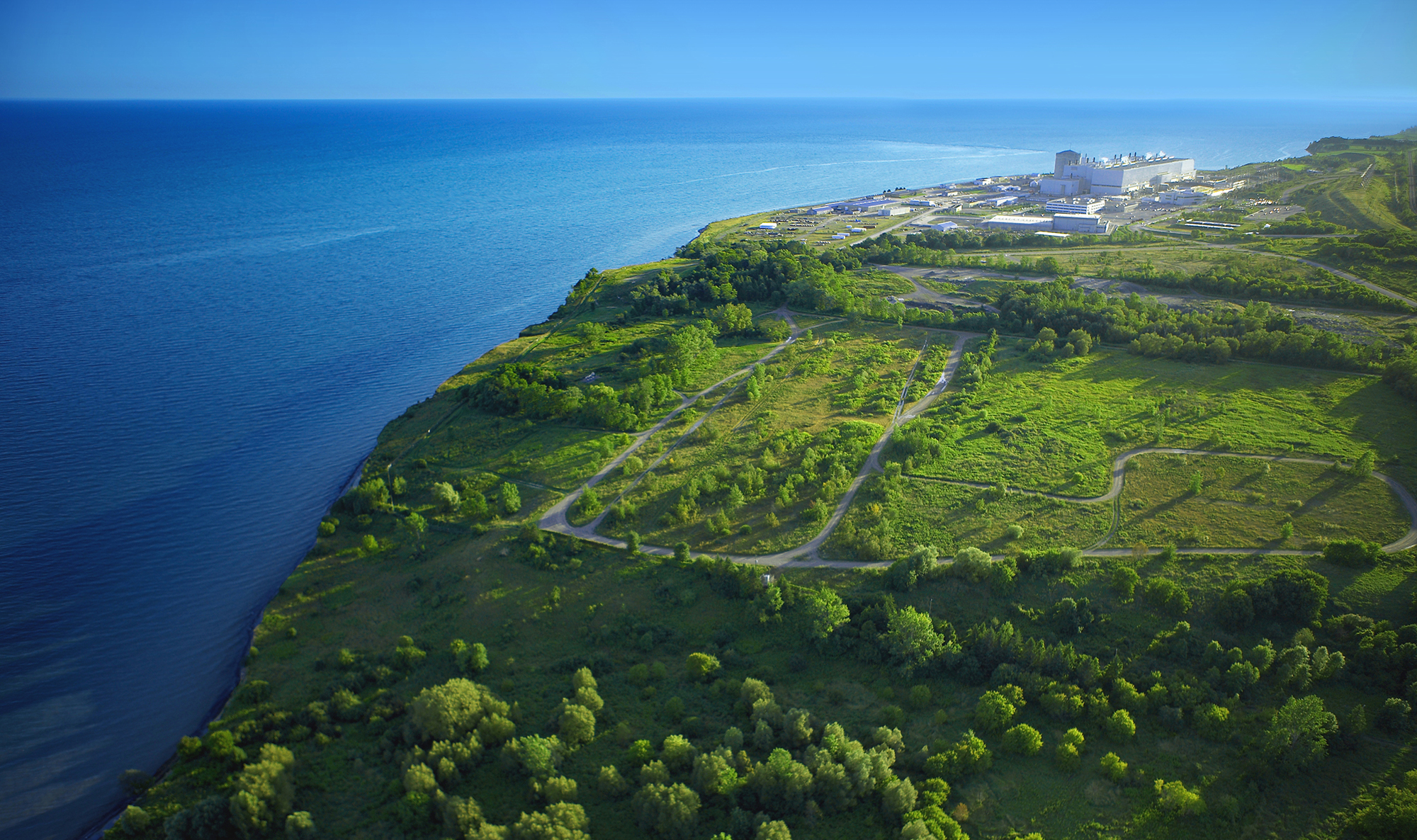 An aerial view of Darlington Nuclear Generating Station from afar.