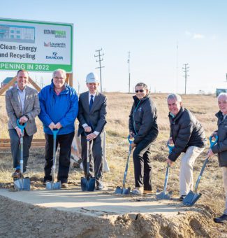 OPG and community stakeholders hold shovels at the groundbreaking for a new facility in Kincardine.