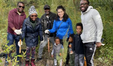 Community members attend a tree planting event