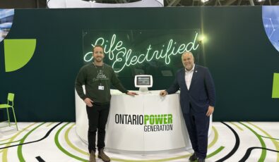 OPG's Adam McClare with Ontario's Minister of Energy, Todd Smith, at the 2023 Canadian International AutoShow.