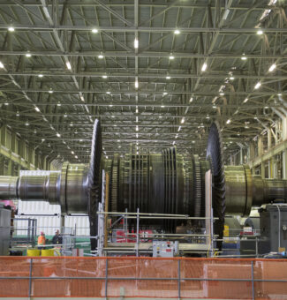 A low-pressure turbine spindle removed and placed on a stand at Darlington Nuclear.