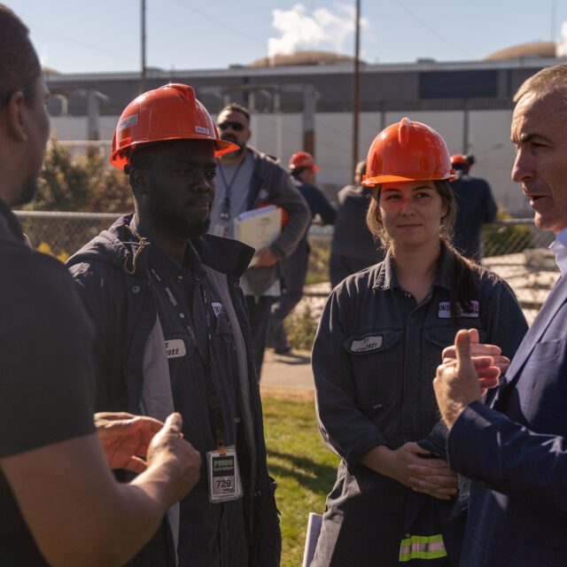 President & CEO Ken Hartwick speaks with employees.