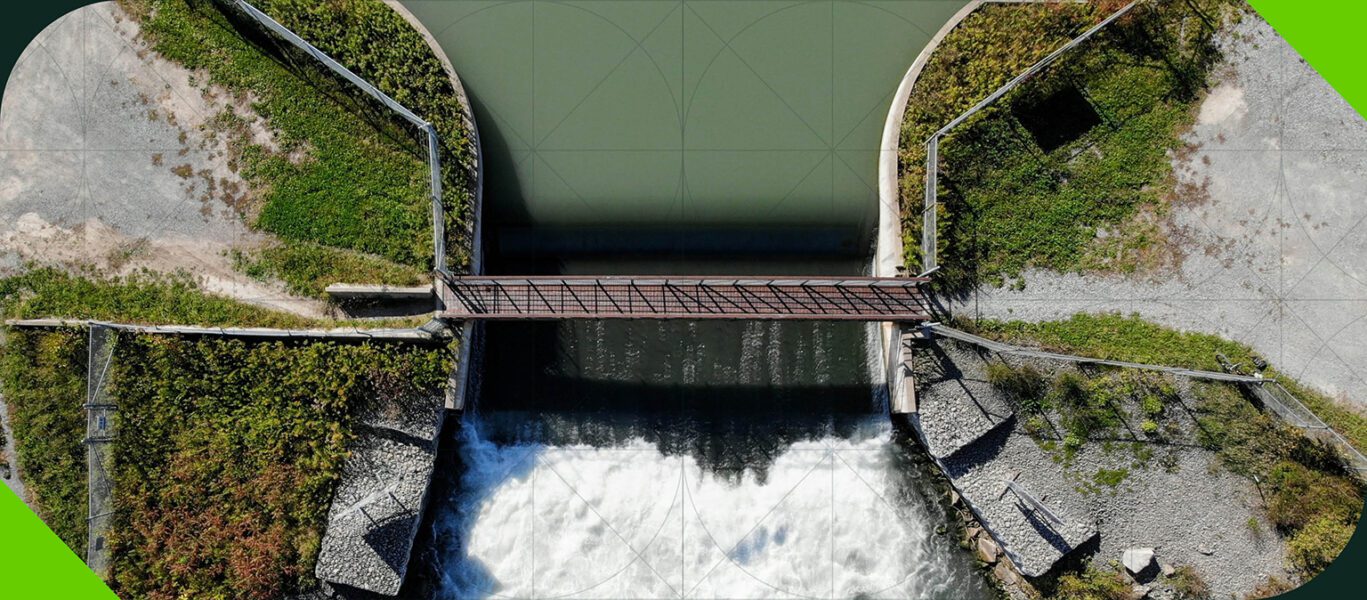The cover image from the latest issue of Net-Zero News, featuring a hydro generating station from above.