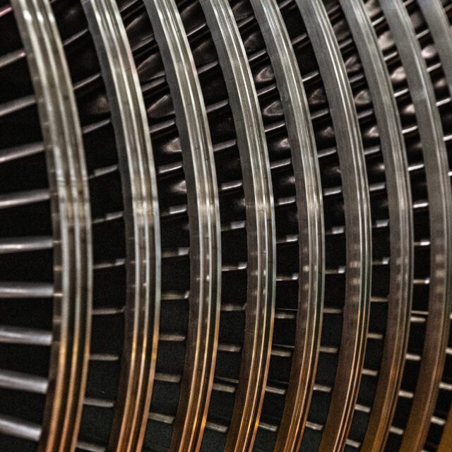 A close-up of the high pressure turbine blade rows, through which steam flows to rotate the turbine.