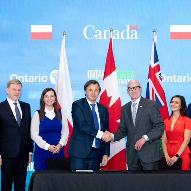 At a signing ceremony near the site of OPG's Darlington New Nuclear Project: (from left to right) Jason Van Wart (Laurentis Energy Partners), Jarek Grodzki (OSGE), MPP Natalia Kusendova (Mississauga Centre), Rafal Kasprow (OSGE), Chris Ginther (OPG), Aida Cipolla (OPG), and Ontario Energy Minister Todd Smith.