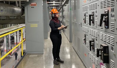 Erum Hasan, System Engineer with OPG, in her natural habitat during System Performance Monitoring (SPM) Time.