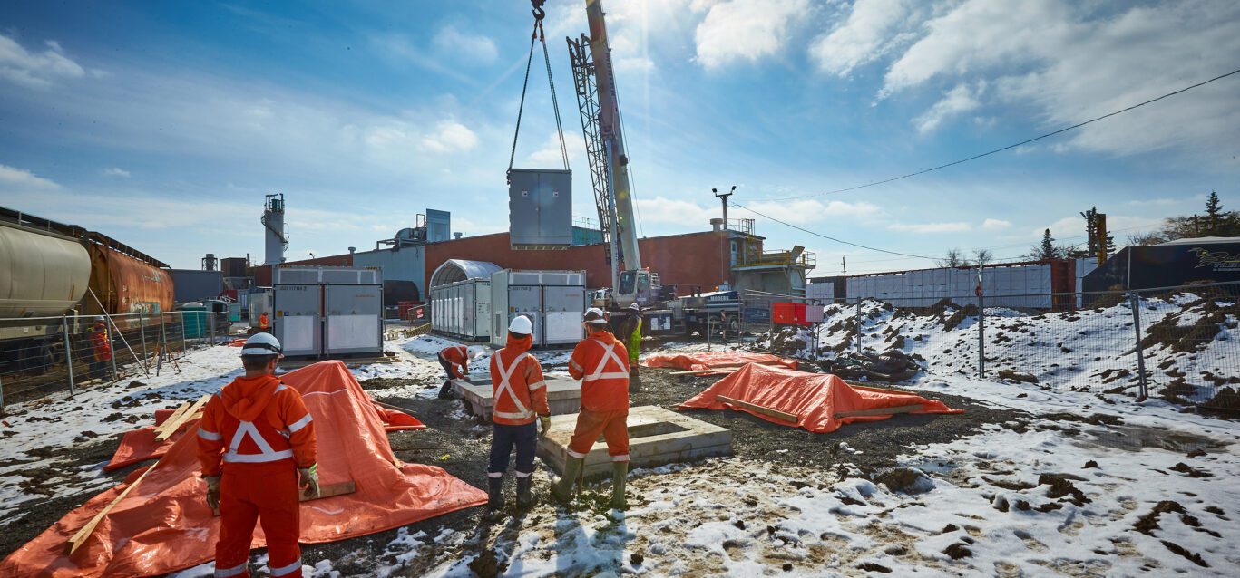 A crane moves a large battery into place at Hagersville.