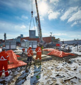 A crane moves a large battery into place at Hagersville.