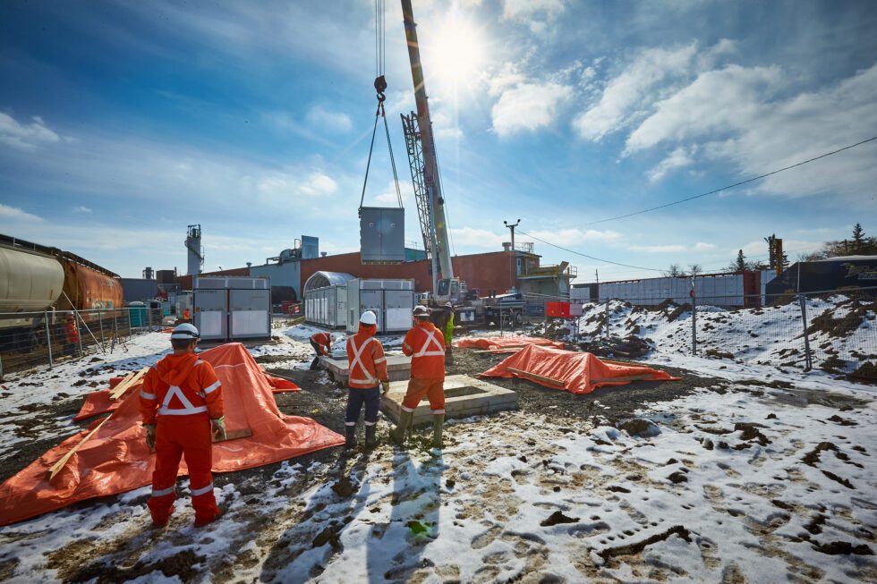 A crane moves a large battery into place at Hagersville.