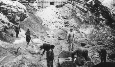 In this historical photo, workers are seen during construction of Stewartville GS.