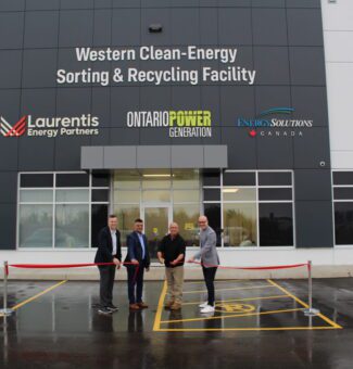 Representatives from OPG, Laurentis Energy Partners, Energy Solutions Canada, and the Mayor of the Municipality of Kincardine, Kenneth Craig, cut the ceremonial ribbon to officially open the Western Clean-Energy Sorting and Recycling (WCSR) facility.