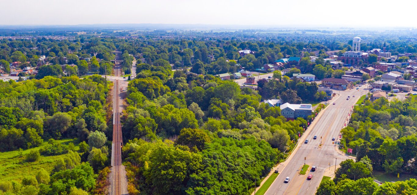 A view of Bowmanville, Ontario from above, showing train tracks.