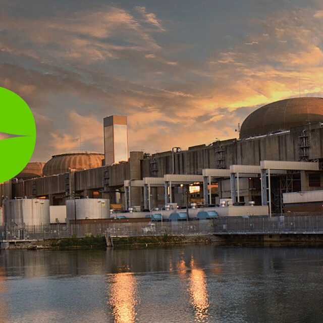 A view of Pickering Nuclear Generating Station from the lake, with a stylize 'P' for Pickering.