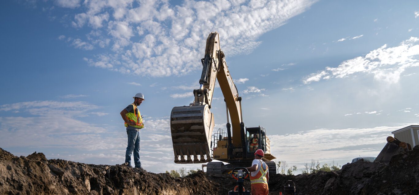 An excavator takes part in early site preparation work for the Darlington New Nuclear Project.