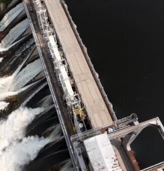 Water rushing from a hydroelectric generating station.