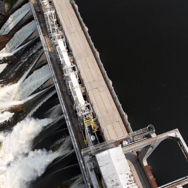 Water rushing from a hydroelectric generating station.