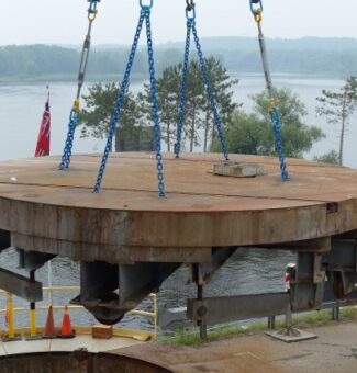 The historic turntable at OPG's Chats Falls Generating Station is lifted out for refurbishment.