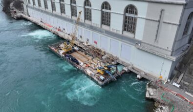 Using a sectional barge, workers dismantled the old tailrace deck at OPG's Sir Adam Beck I hydro station before constructing a new, wider deck and related upgrades.