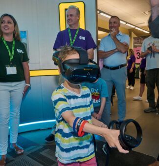 A visitor takes a virtual reality tour of a small modular reactor at OPG's 2024 Community Power Expo.