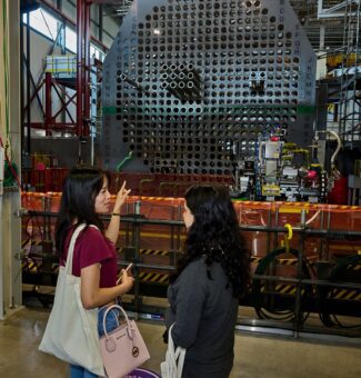 Visitors take a look at the full-scale reactor mock-up at the Darlington Energy Complex during OPG's 2024 Community Power Expo. More than 3,200 members of the public attended the annual event.