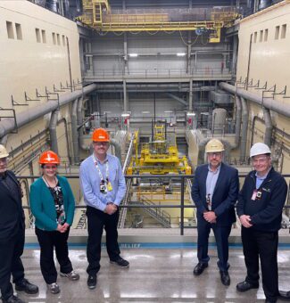 OPG and Nordion employees survey Darlington Nuclear's recently refurbished Unit 1, which has been modified to produce life-saving Cobalt-60 isotopes.