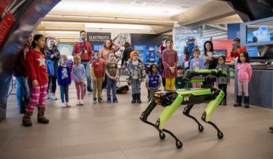 Visitors check out Boston Dynamics' Spot robot in action during March Break Fun at OPG's Darlington Nuclear visitor centre.